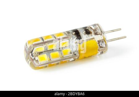 Close-up view of a modern bipin G4 socket LED lamp on white background demonstrating modern eco energy saving technology Stock Photo