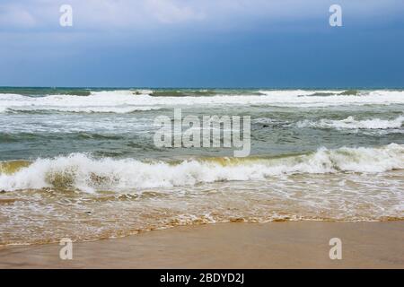 Stormy cloudy weather on the sea and the waves Stock Photo