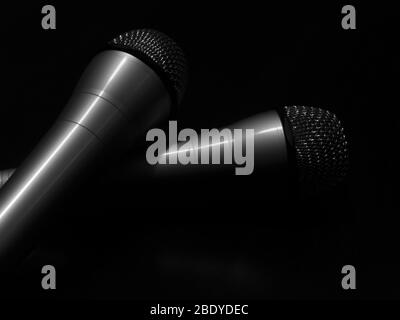 black and white two microphones concept Stock Photo
