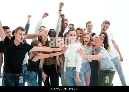 team of young people supporting their comrade Stock Photo