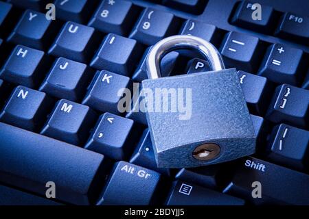 Cyber Security Concept Closed Padlock on the Computer Keyboard. Cloud Data and Work from Home Securely Concept. Stock Photo