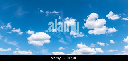 Blue sky background with white clouds. Stock Photo