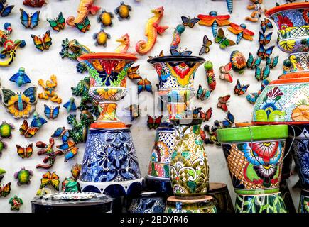 A wall covered with crafts in Tonala, Jalisco, Mexico. Stock Photo