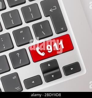 Emergency concept: Phone and 911 in red on computer keyboard. Stock Photo