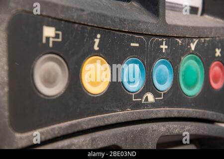 Dirty buttons on a parking ticket machine Stock Photo