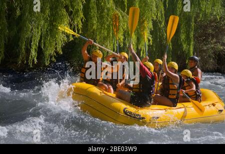San Rafael, Mendoza - 2019-12-30: A group of people rafting on Atuel River, one of the best places in the province for adventure tourism. Stock Photo