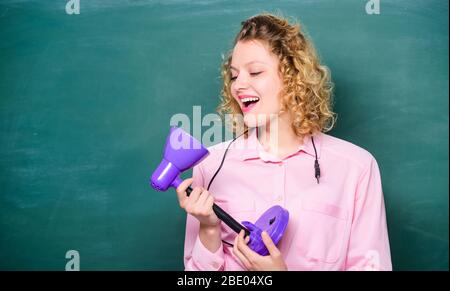 Light up process of studying. Insight and idea. Bright shiny idea. Creativity and inspiration. Educational idea. Knowledge day. Enlightenment concept. Teacher hold table lamp chalkboard background. Stock Photo