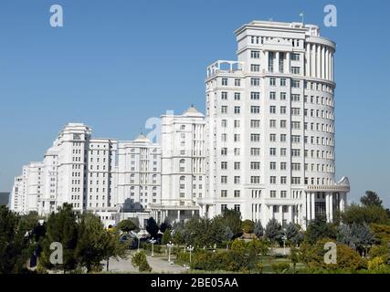 Multiple luxury residential buildings built with white marble in Ashgabat, Turkmenistan in Central Asia. Empty white marble edifices. Stock Photo