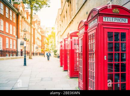 Traditional red telephone boxes in London, UK Stock Photo