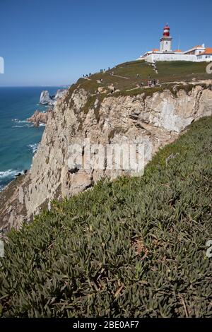 Cabo da Roca Viewpoint looking out to sea, part of a national park, with a lighthouse. Cape Roca near Azóia Colares, near Lisbon Portugal Stock Photo