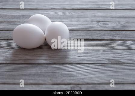 white eggs on wooden table Stock Photo