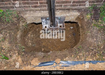 Repairs for a house that has settled and cracked foundation Stock Photo