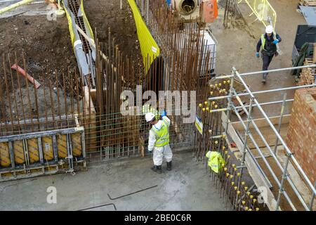 Workers at construction site at Stratford, London England United Kingdom UK Stock Photo