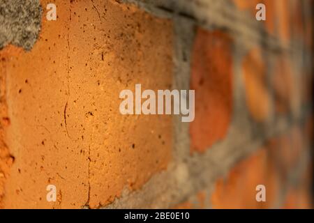 Red bricks old retro wall texture close up macro background. Rough pattern surface Stock Photo