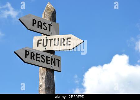 Past, future, present signpost Stock Photo