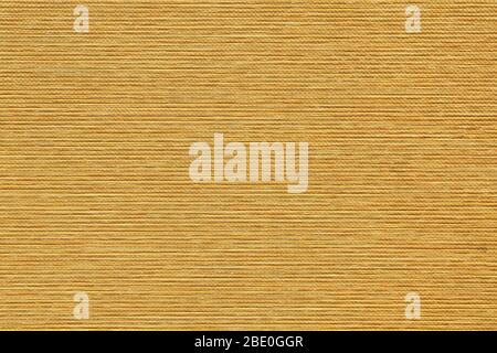 Yellow bamboo fabric background texture. Dense horizontal weaving. Stock Photo