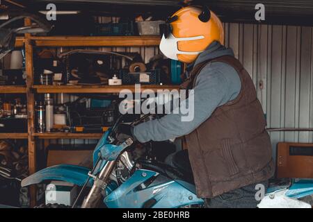 Emoji motocross rider with fancy nerd sunglasses, preparing his ...