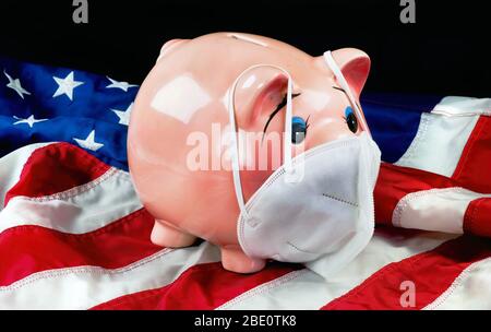 Piggy Bank wearing N95 face mask for protection of COVID-19 Stock Photo