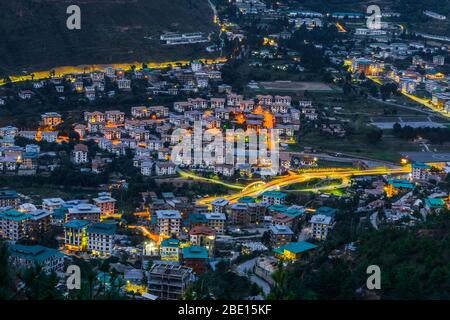 Light trails over the city during the rush hour dusk Stock Photo