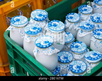 Beijing, China - March 8, 2015: Beijing yogurt being sold on the streets in the morning Stock Photo