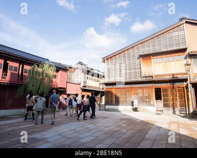 Kanazawa, Japan - September 28, 2015: Tourists strolling along the rows of traditional Japanese houses in Higashi Chaya old geisha district Stock Photo