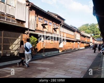 Kanazawa, Japan - September 28, 2015: Tourists strolling along the rows of traditional Japanese houses in Higashi Chaya old geisha district Stock Photo