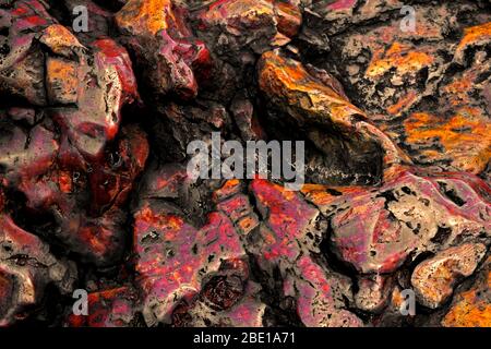 Close up background photo on the texture of a large stone of red jasper Stock Photo
