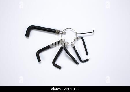 A family of black L-shaped hexagon wrench ( Upper view, selective focus, abstract ) Stock Photo