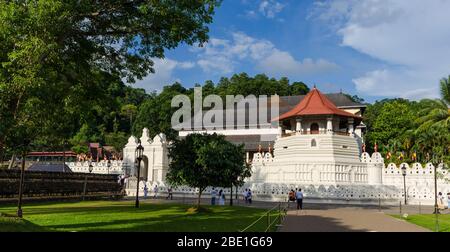 Temple Of The Sacred Tooth Relic, That Is Located In The Royal Palace Complex Of The Former Kingdom Of Kandy, Sri Lanka, Which Houses The Relic Of The Stock Photo