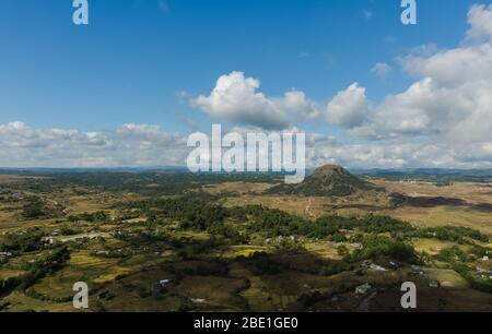 amazing landscape in the countryside with a stream flowing by and a vista of the clouds and the mountains Stock Photo