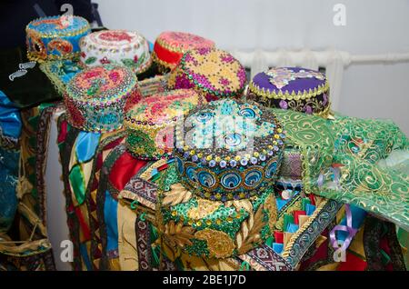 Tradional Azerbaijani souveniers hats and knitted clothing sold . They would wear a rider under the headgear hat, stroke . Araxchin is a national hood Stock Photo