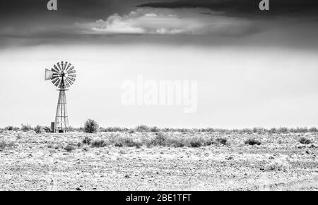 Lone windmill on a farm in south africa Stock Photo