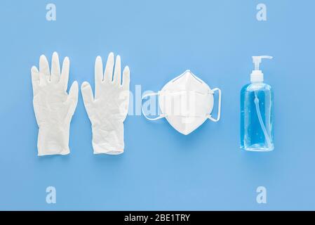 Medical gloves mask and alcohal gel sanitizer for protecting infection during COVID-19 pandemic Stock Photo