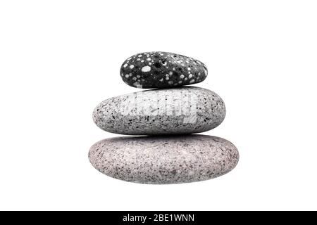 Pile of pebble stone on white background isolated closeup, stack of balanced zen stones, smooth sea pebbles pyramid, round cobblestones tower, rocks Stock Photo