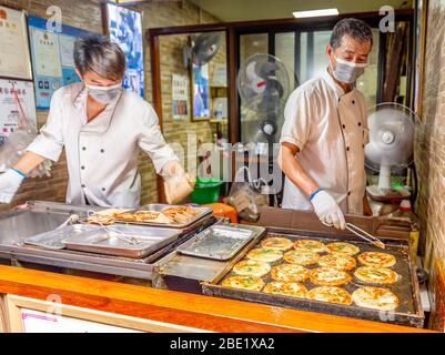 Street food seller in china. Stock Photo