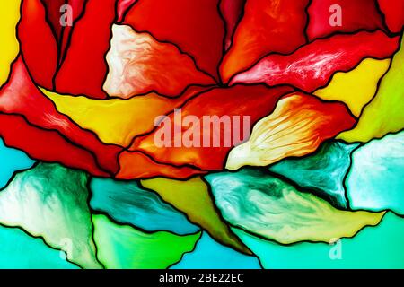 Photo of a small fragment of a beautiful colorful stained glass background including red, yellow, and green pieces. Abstract background.. Stock Photo
