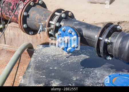 Construction site on a water pipe as supply line for construction area Stock Photo