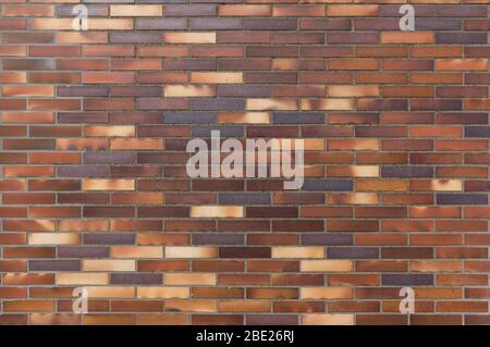 Detail of an old wall of yellow to brownish clinker bricks Stock Photo
