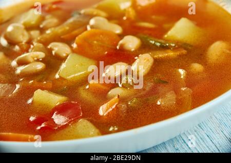 Israeli White Bean Soup, chicken broth and beans. Stock Photo