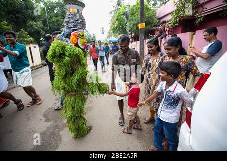 traditional kummatti folk dance performers during onam celebration,thrissur,kizhakkumpattukara kummatti,kerala,onam festival,india,pradeep subramanian Stock Photo