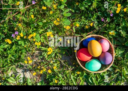 colorful easter eggs in a basket Stock Photo