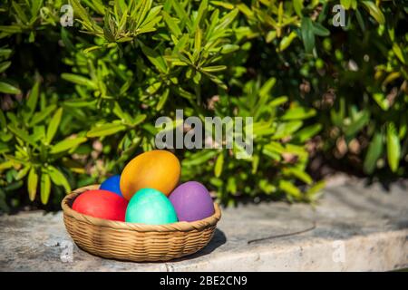 colorful easter eggs in a basket Stock Photo
