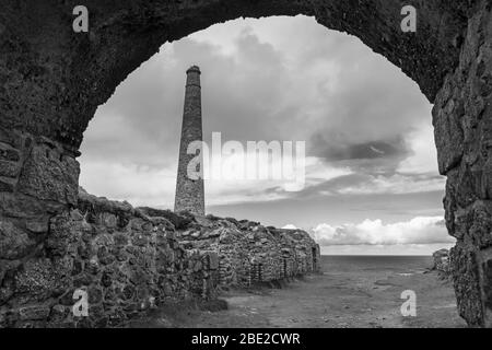Calciner labyrinth and stack, Botallack Mine, UNESCO World Heritage Site, Penwith Peninsula, Cornwall, UK.  Black and white version Stock Photo