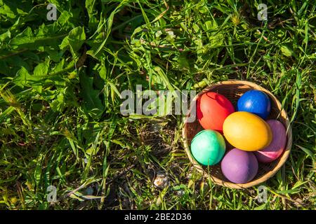colorful easter eggs in a basket Stock Photo