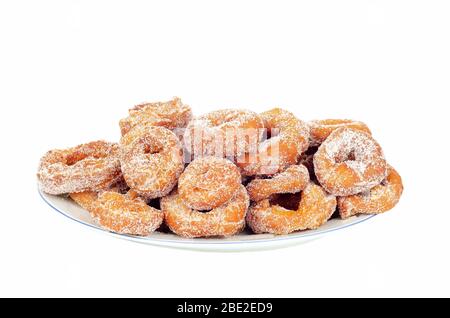 delicious ring doughnut on a plate isolated on white background Stock Photo