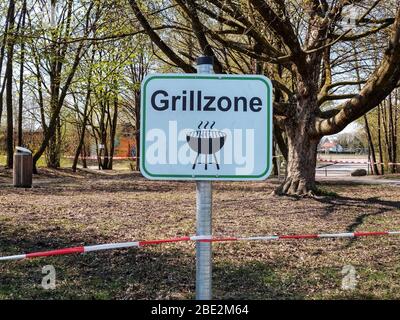Munich, Bavaria, Germany. 11th Apr, 2020. A signs in Karlsfeld, a town near Munich, Germany, indicating that grilling is banned. Credit: Sachelle Babbar/ZUMA Wire/Alamy Live News Stock Photo