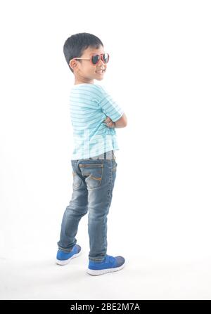 portrait of cute Asian boy  student wearing glasses thinking isolated on white background Stock Photo