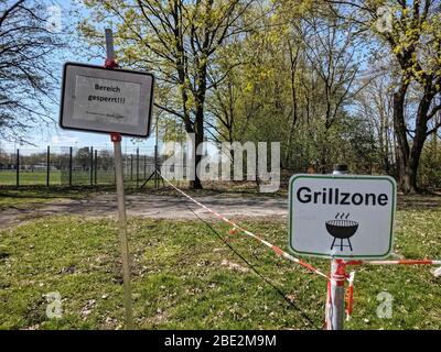 Munich, Bavaria, Germany. 11th Apr, 2020. A signs in Karlsfeld, a town near Munich, Germany, indicating that grilling is banned. Credit: Sachelle Babbar/ZUMA Wire/Alamy Live News Stock Photo