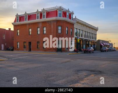 Fort MacLeod, Alberta, Canada - April 09, 2020: Sun setting on the prairie town’s historic Main Street Stock Photo