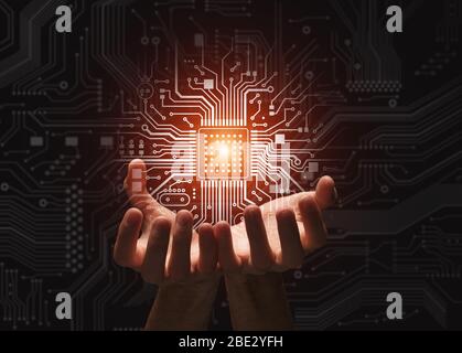 High tech. Unrecognizable person holding glowing microchip over electric circuit background, collage Stock Photo